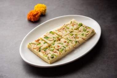 Milk powder barfi also known as Mava burfi, white Khoya burfi or Barfee, Indian Sweet food