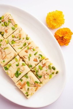 Milk powder barfi also known as Mava burfi, white Khoya burfi or Barfee, Indian Sweet food