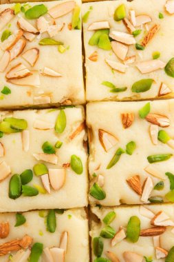 Milk powder barfi also known as Mava burfi, white Khoya burfi or Barfee, Indian Sweet food