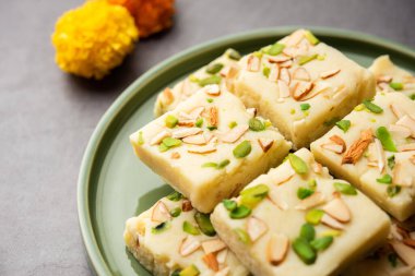 Milk powder barfi also known as Mava burfi, white Khoya burfi or Barfee, Indian Sweet food