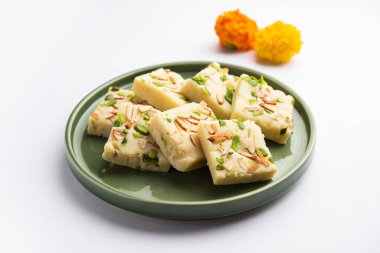 Milk powder barfi also known as Mava burfi, white Khoya burfi or Barfee, Indian Sweet food