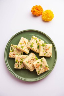 Milk powder barfi also known as Mava burfi, white Khoya burfi or Barfee, Indian Sweet food