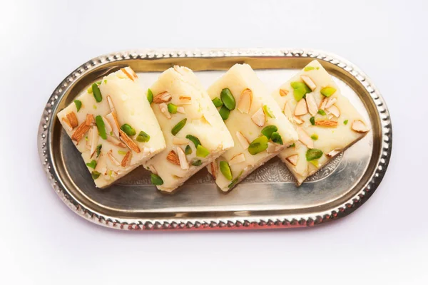 Milk powder barfi also known as Mava burfi, white Khoya burfi or Barfee, Indian Sweet food