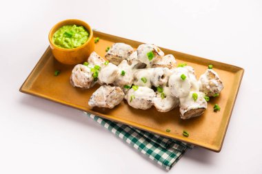 vegetarian soya malai chap made using soya chaap with white creamy gravy