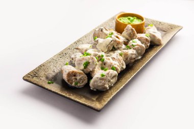 vegetarian soya malai chap made using soya chaap with white creamy gravy