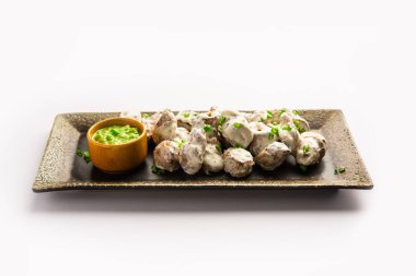 vegetarian soya malai chap made using soya chaap with white creamy gravy