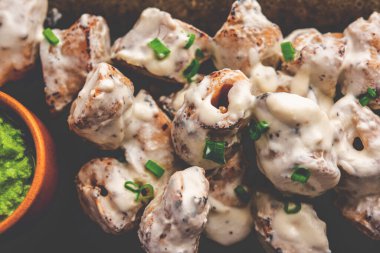 vegetarian soya malai chap made using soya chaap with white creamy gravy