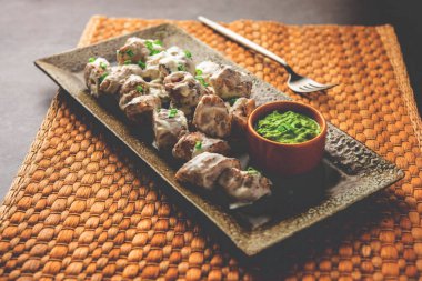 vegetarian soya malai chap made using soya chaap with white creamy gravy