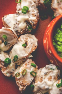 vegetarian soya malai chap made using soya chaap with white creamy gravy