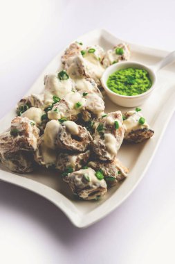 vegetarian soya malai chap made using soya chaap with white creamy gravy