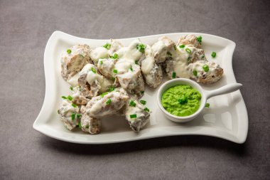 vegetarian soya malai chap made using soya chaap with white creamy gravy