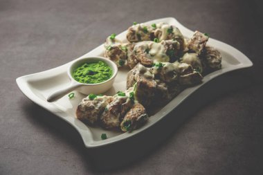 vegetarian soya malai chap made using soya chaap with white creamy gravy