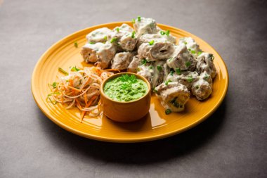vegetarian soya malai chap made using soya chaap with white creamy gravy