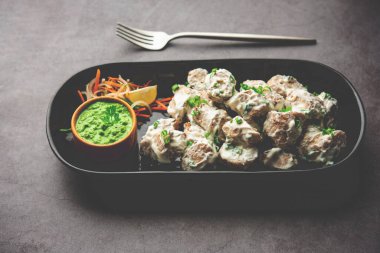 vegetarian soya malai chap made using soya chaap with white creamy gravy