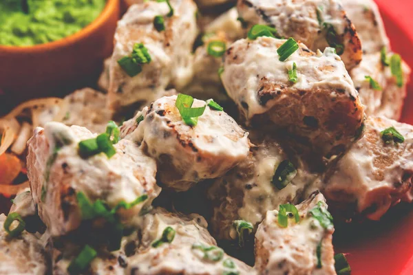 vegetarian soya malai chap made using soya chaap with white creamy gravy