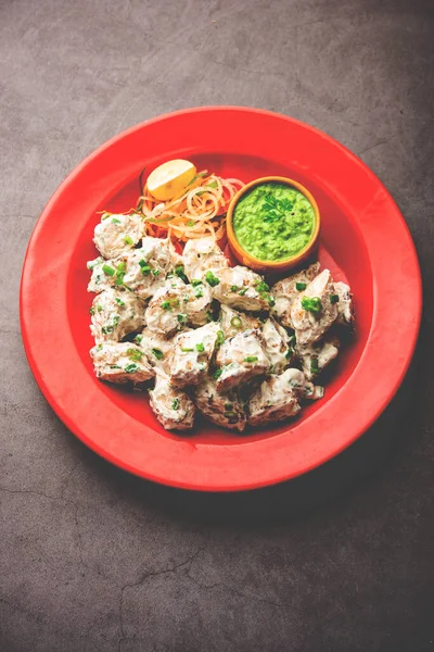 vegetarian soya malai chap made using soya chaap with white creamy gravy