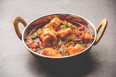 Punjabi soya chaap gravy or dhaba style soya chap masala sabzi served with naan