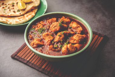 Punjabi soya chaap gravy or dhaba style soya chap masala sabzi served with naan