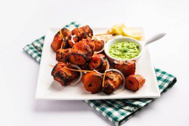 Tandoori Soya Chaap or soy chap dish prepared by marinating in tandoori spices, closeup view