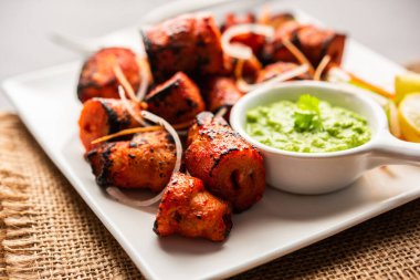 Tandoori Soya Chaap or soy chap dish prepared by marinating in tandoori spices, closeup view