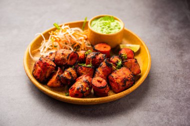 Tandoori Soya Chaap or soy chap dish prepared by marinating in tandoori spices, closeup view