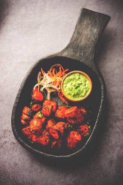 Tandoori Soya Chaap or soy chap dish prepared by marinating in tandoori spices, closeup view
