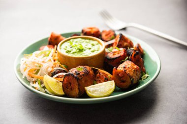 Tandoori Soya Chaap or soy chap dish prepared by marinating in tandoori spices, closeup view