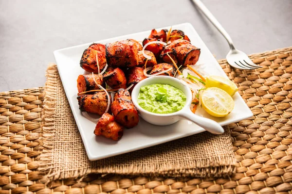 Tandoori Soya Chaap or soy chap dish prepared by marinating in tandoori spices, closeup view
