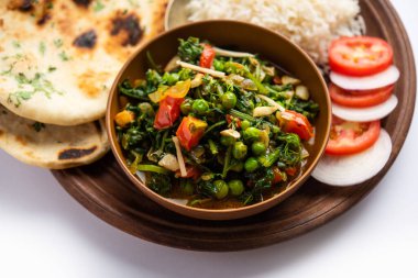 palak matar curry also known as spinach geen peas masala sabzi or sabji, indian food