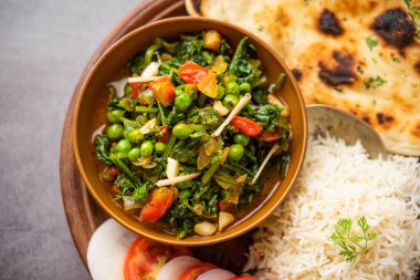 palak matar curry also known as spinach geen peas masala sabzi or sabji, indian food