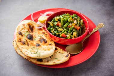 palak matar curry also known as spinach geen peas masala sabzi or sabji, indian food