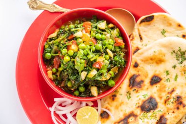 palak matar curry also known as spinach geen peas masala sabzi or sabji, indian food