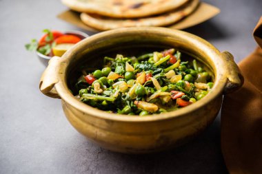 palak matar curry also known as spinach geen peas masala sabzi or sabji, indian food