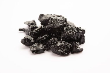 Shilajit is an ayurvedic medicine found primarily in the rocks of the Himalayas. selective focus
