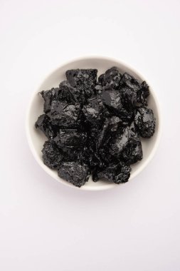 Shilajit is an ayurvedic medicine found primarily in the rocks of the Himalayas. selective focus