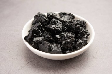 Shilajit is an ayurvedic medicine found primarily in the rocks of the Himalayas. selective focus