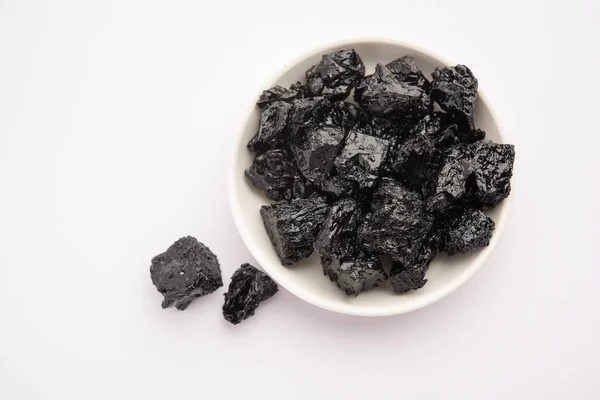 Shilajit is an ayurvedic medicine found primarily in the rocks of the Himalayas. selective focus
