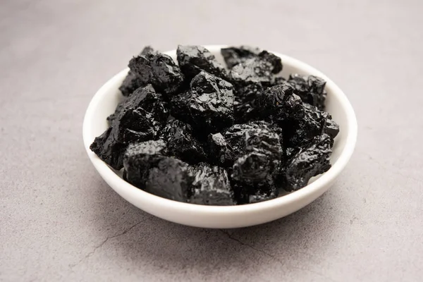 Shilajit is an ayurvedic medicine found primarily in the rocks of the Himalayas. selective focus