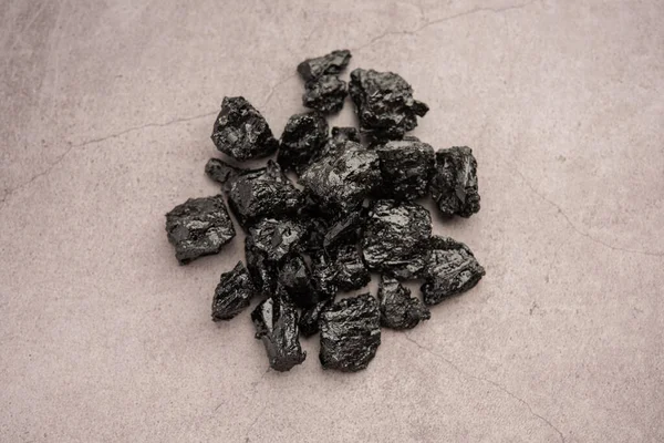 Shilajit is an ayurvedic medicine found primarily in the rocks of the Himalayas. selective focus