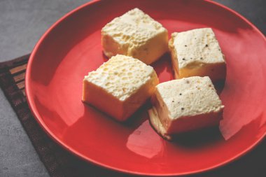 Kharvas or Cheek, Chik, Bari, Pis or Junnu is a sweet dairy product made from bovine colostrum