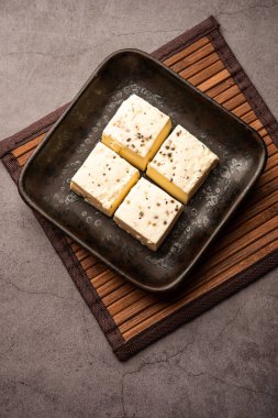 Kharvas or Cheek, Chik, Bari, Pis or Junnu is a sweet dairy product made from bovine colostrum