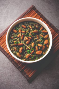 Palak rajma Masala is an Indian curry prepared with red kidney beans & spinach cooked with spices
