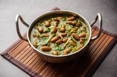Palak rajma Masala is an Indian curry prepared with red kidney beans & spinach cooked with spices