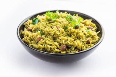 Palak khichdi is a one pot nutritious meal of mung lentils and rice with spinach, Indian food