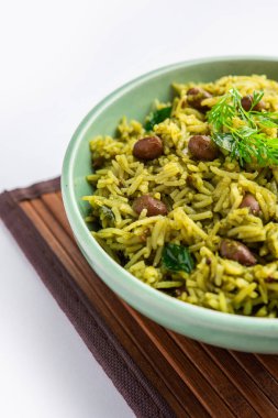 Palak khichdi is a one pot nutritious meal of mung lentils and rice with spinach, Indian food