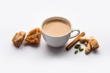 Jaggery tea or Gur ki chai with ingredients like gud, ginger or adrak, green cardamom and cinnamon