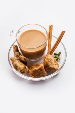 Jaggery tea or Gur ki chai with ingredients like gud, ginger or adrak, green cardamom and cinnamon