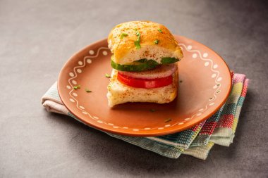 Mumbai style pav sandwich or leftover paav used for veg burger