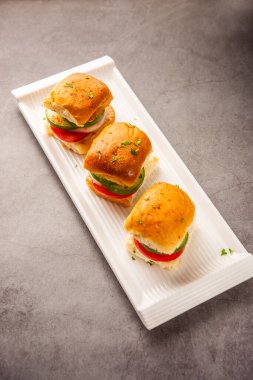 Mumbai style pav sandwich or leftover paav used for veg burger