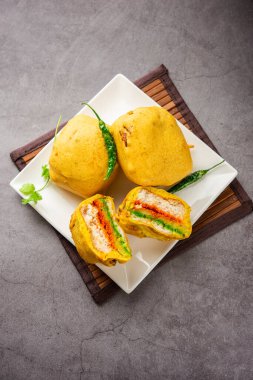 Ulta Vada Pav is made with a spicy potato stuffed bun, called pav inside vada, inside out wada pao